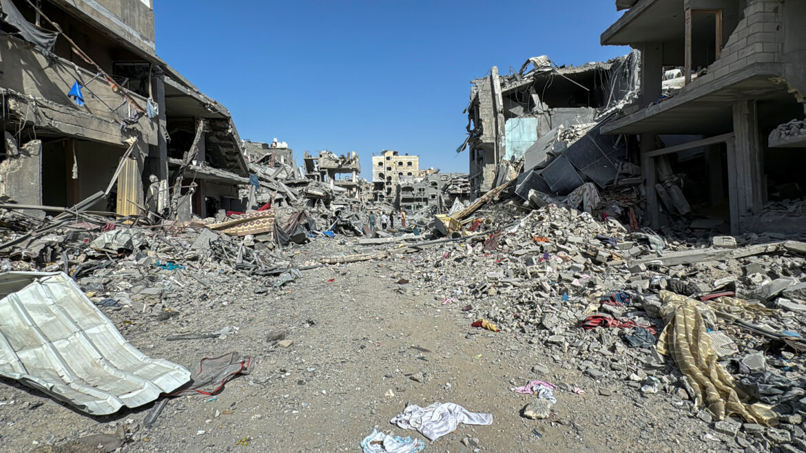 Palestinians view the damage after Israeli forces withdrew from the area around Kamal Adwan hospital, amid the ongoing Israel-Hamas conflict, in Jabalia, in the northern Gaza Strip