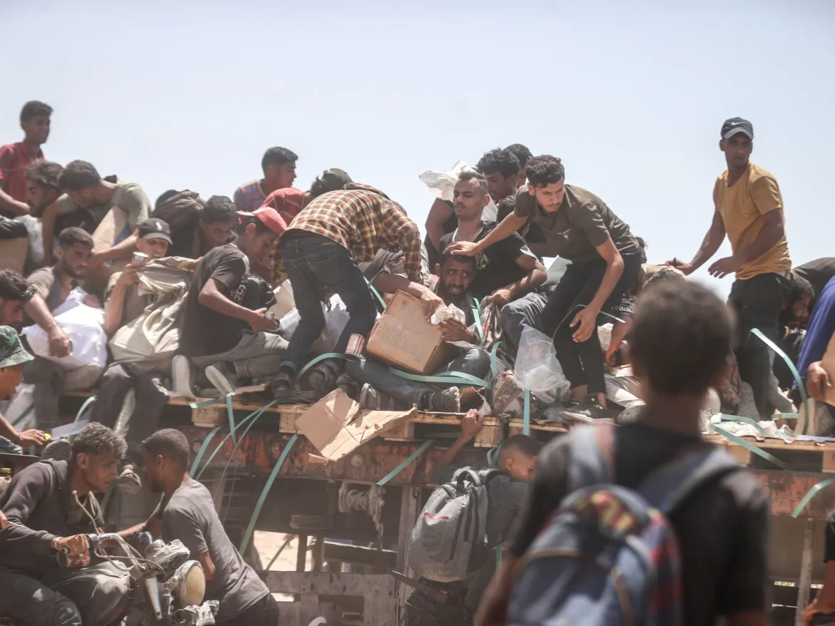 AA-20250730-38706649-38706642-STARVING_PALESTINIANS_FLOCK_TO_AID_POINT_FOR_SCARCE_FLOUR_AMID_ISRAELI_BLOCKADE-1753892341